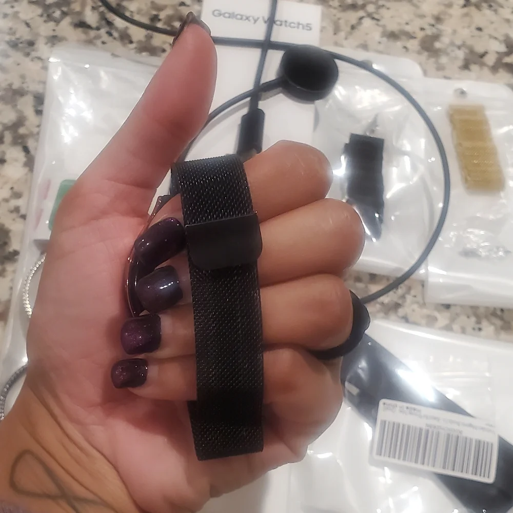 Samsung Galaxy Watch5 44mm with Black and Gold Accessories